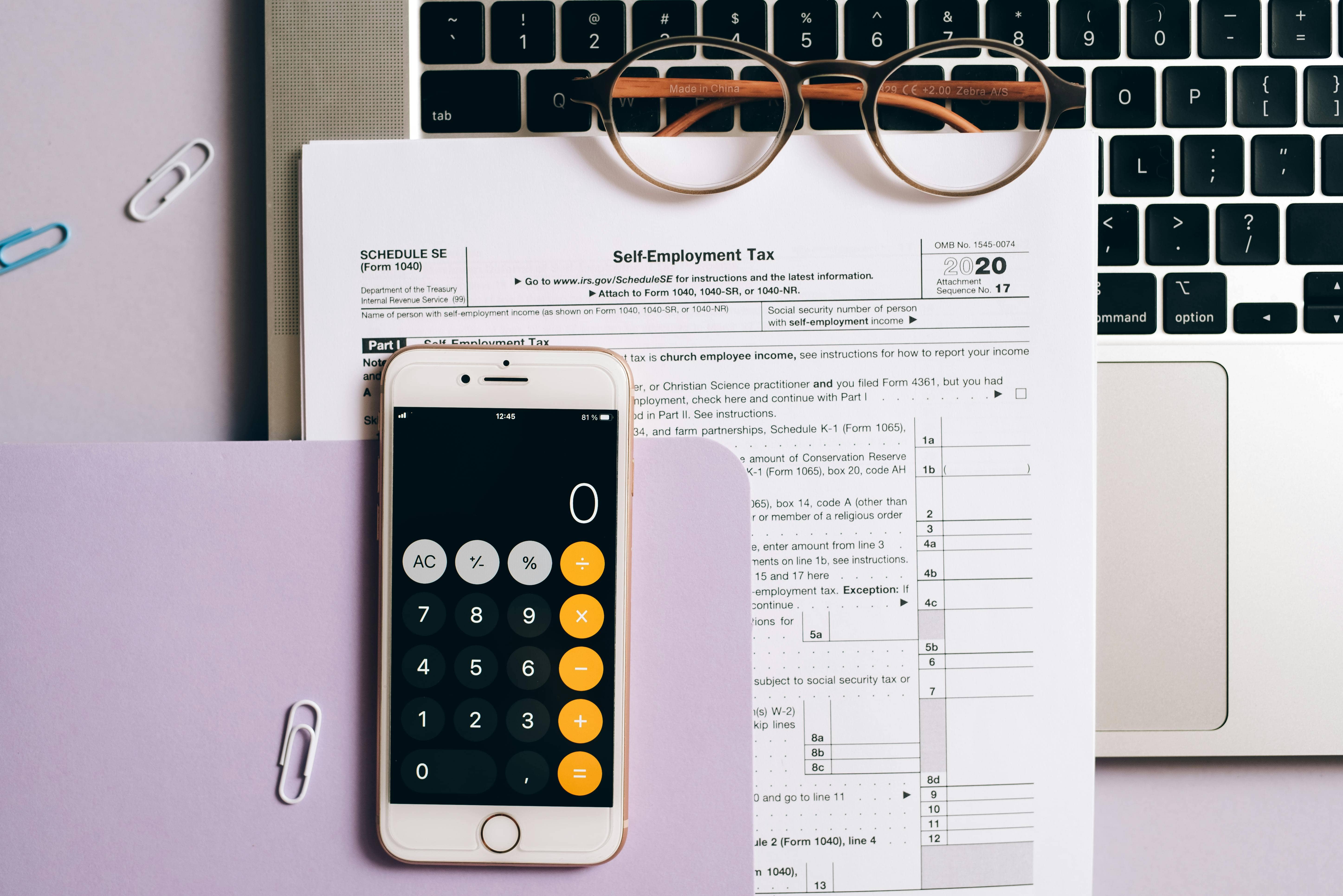 calculator on top of tax documents