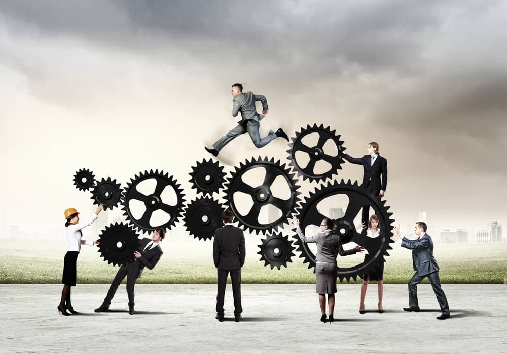 Conceptual image of business team working cohesively. Interaction and unity